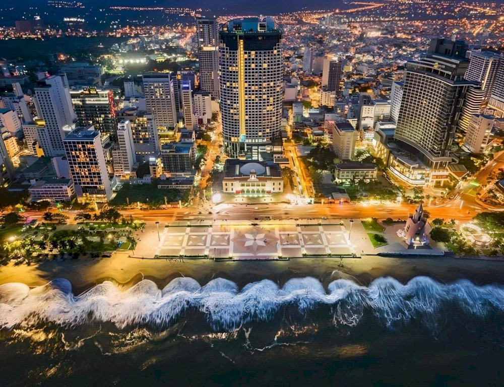 The artistic lighting system transforms the tower into a vibrant centerpiece, enhancing the city's coastal charm